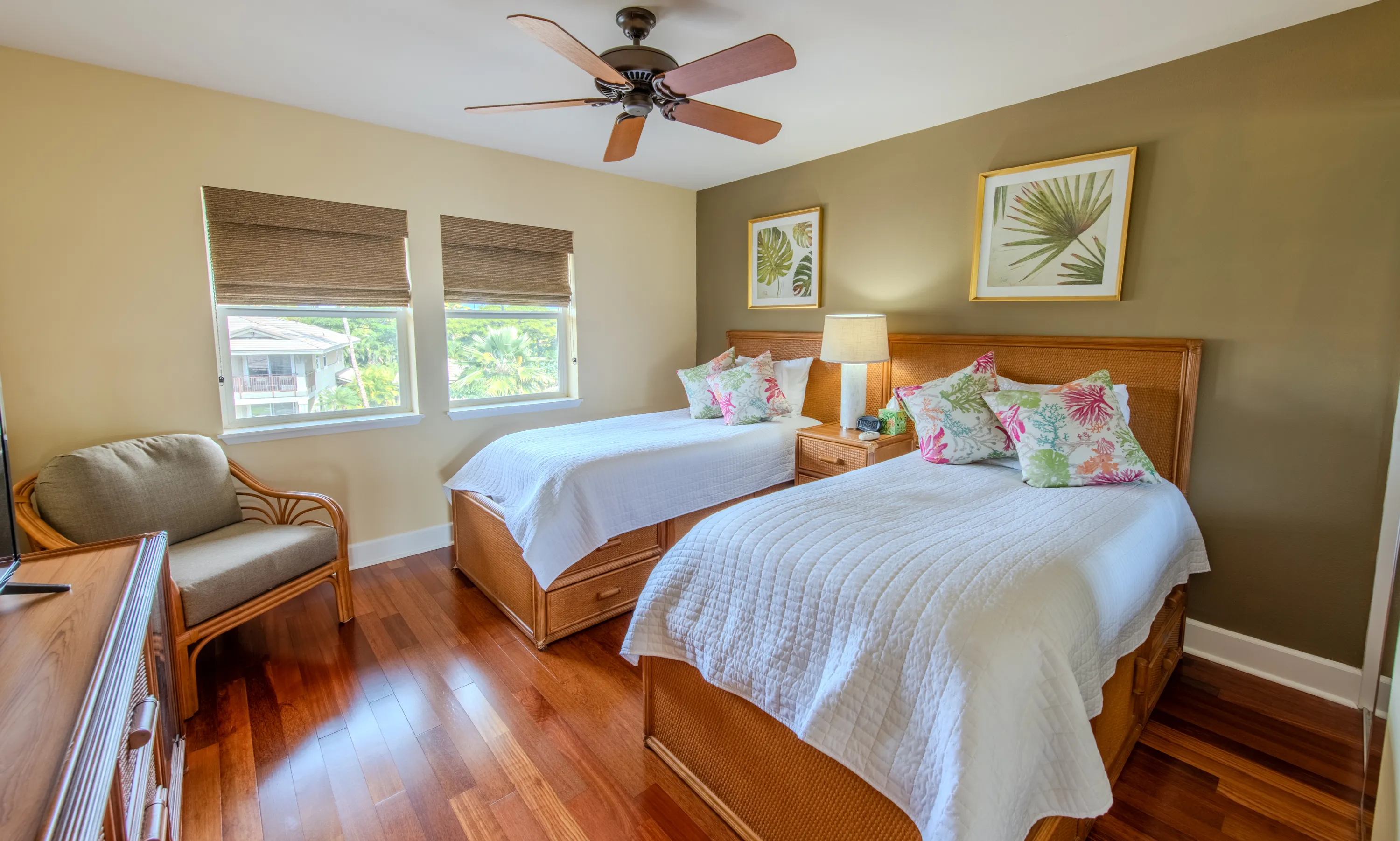 Primary bedroom with a king bed and ceiling fan