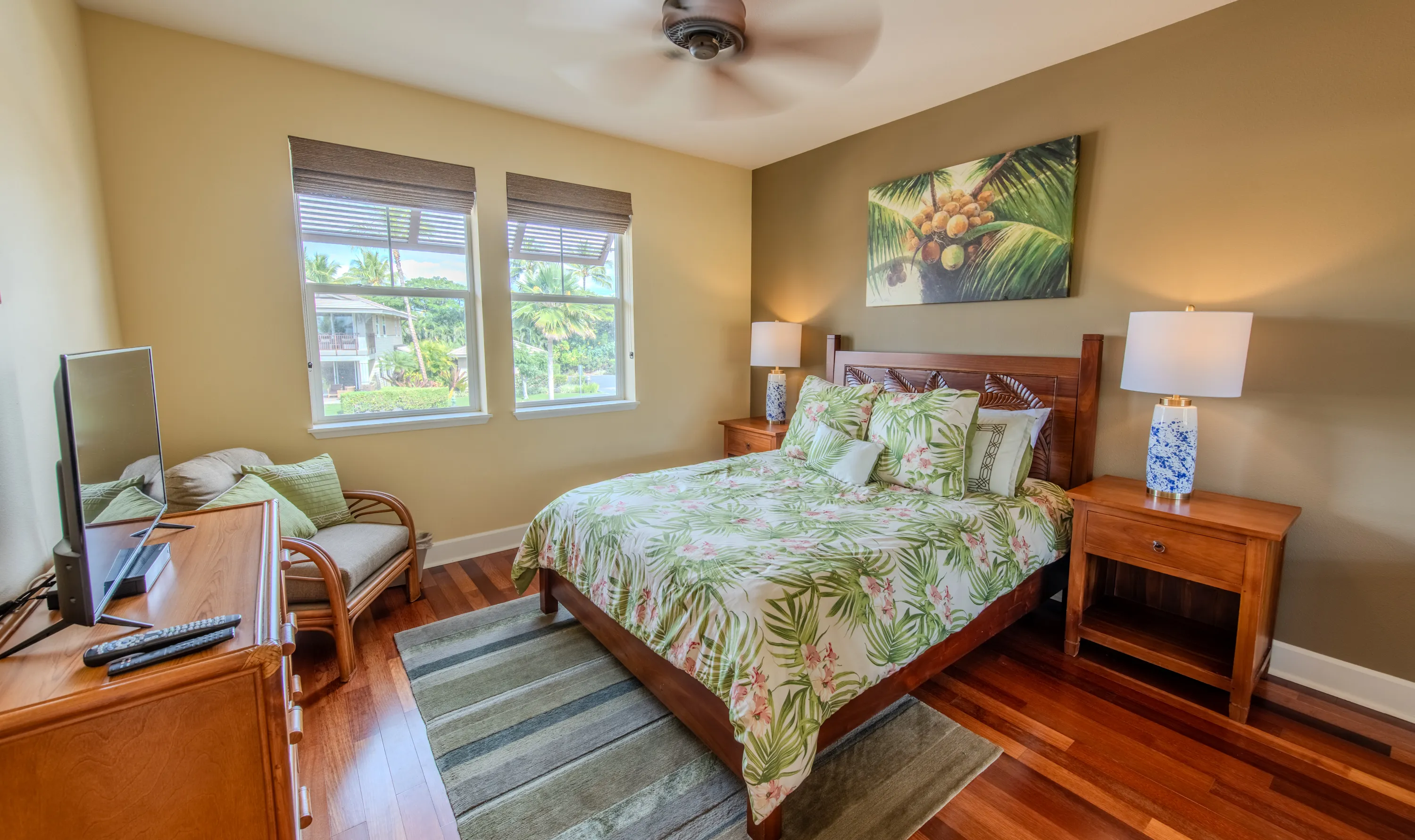 Bedroom with a garden outlook and two nightstands