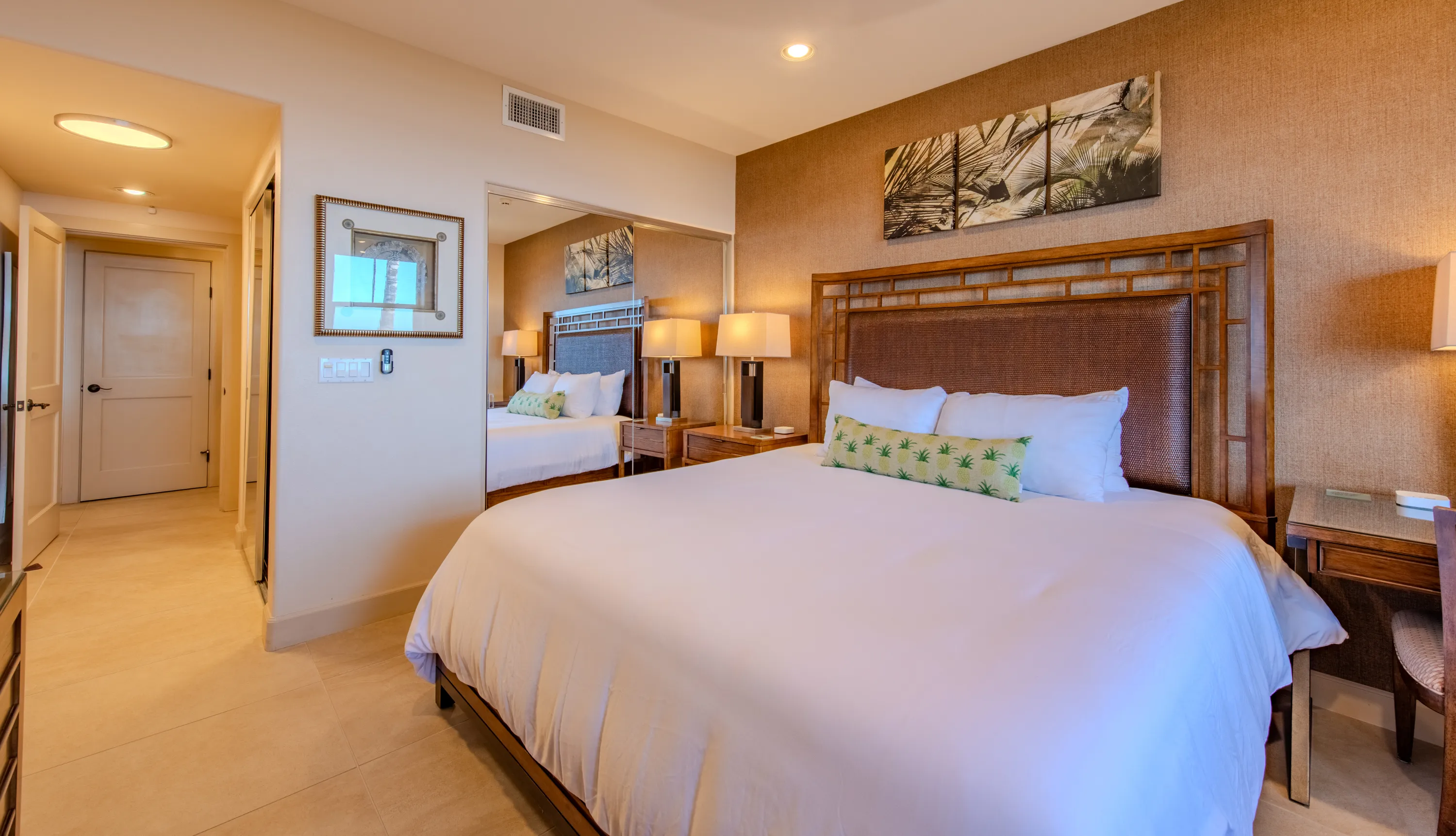 Primary bedroom with a king bed and crisp white linens