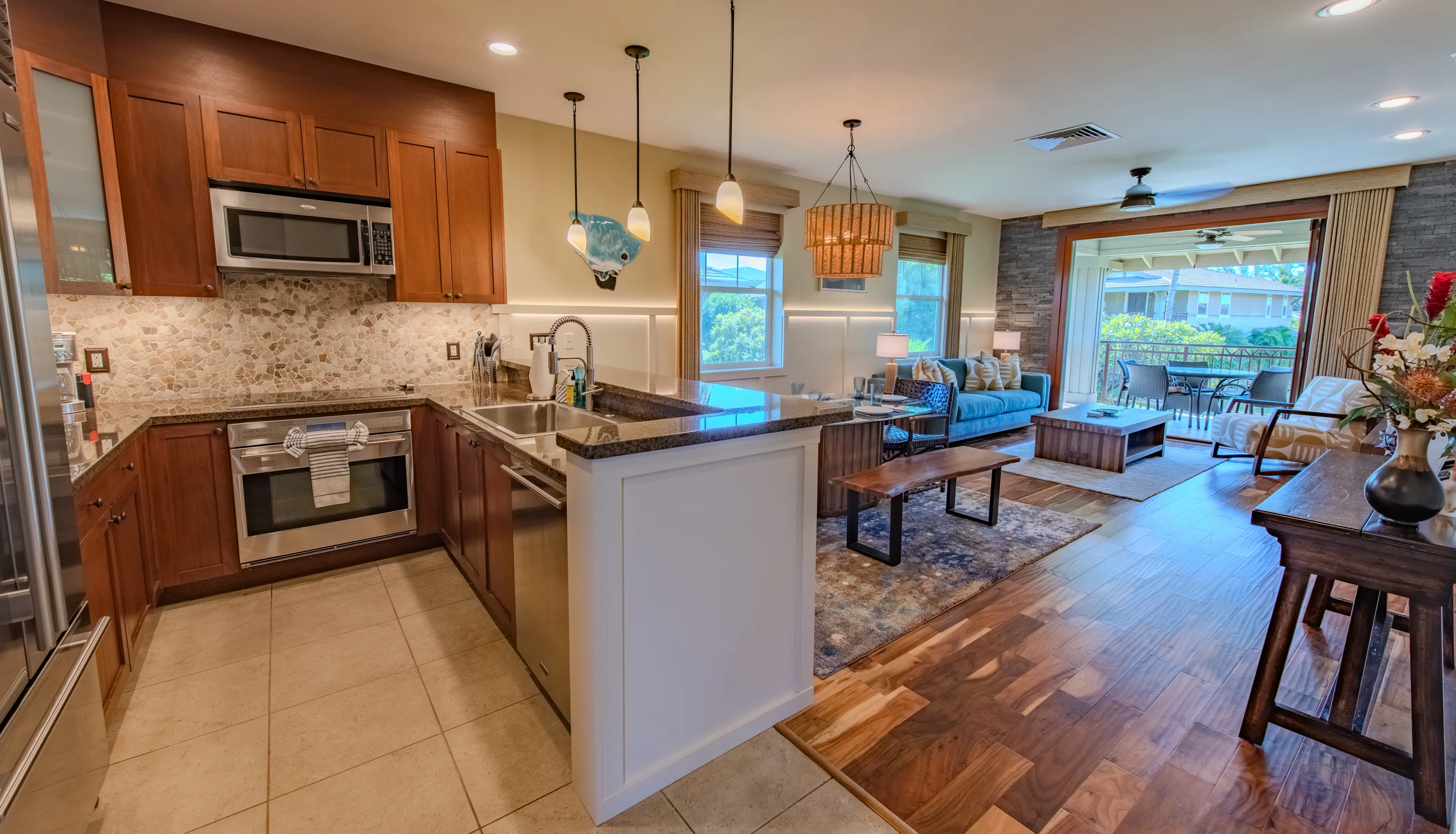 Kitchen with breakfast bar seating and full appliances