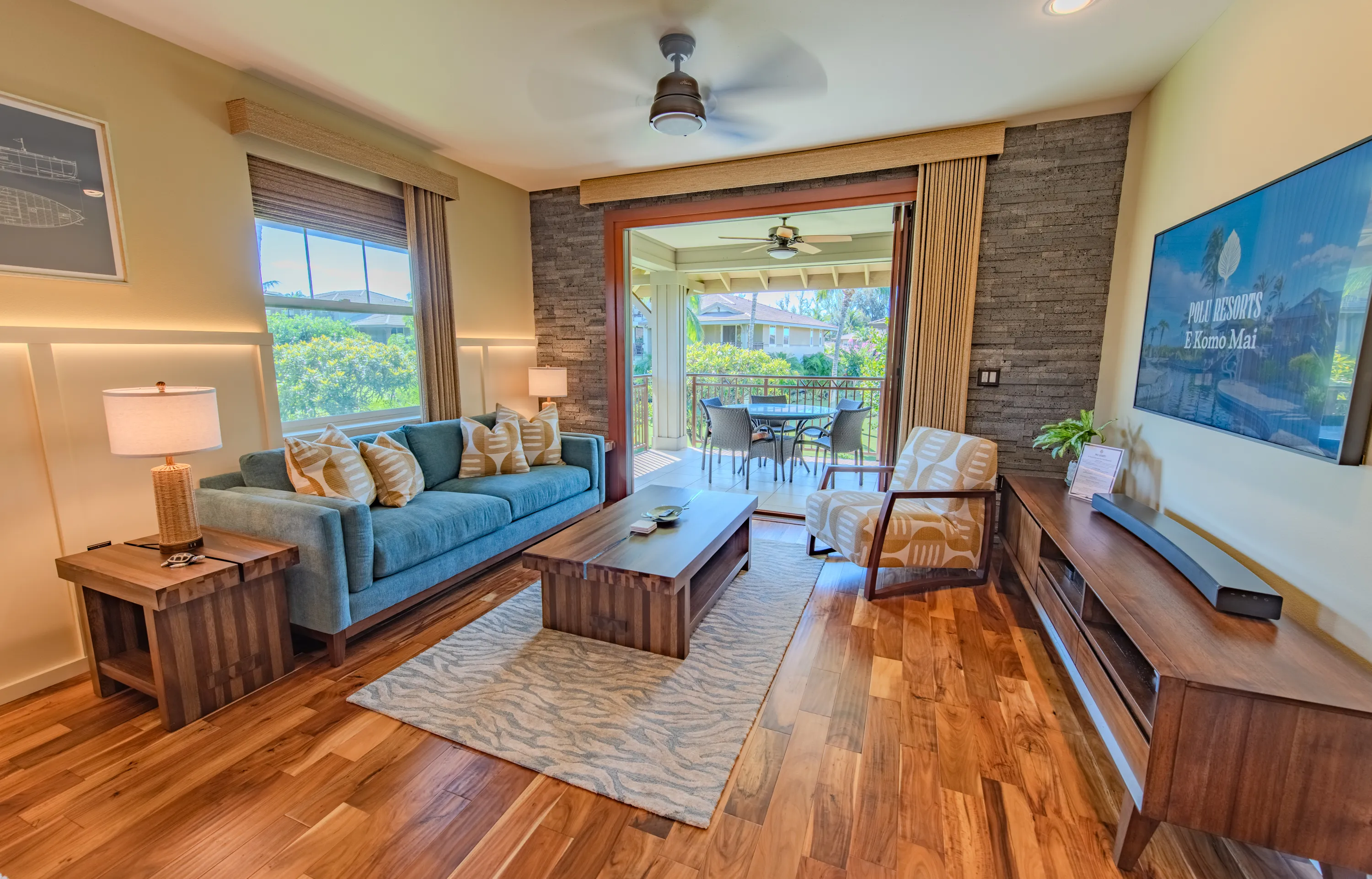 Living room with lounge seating and warm wood floors