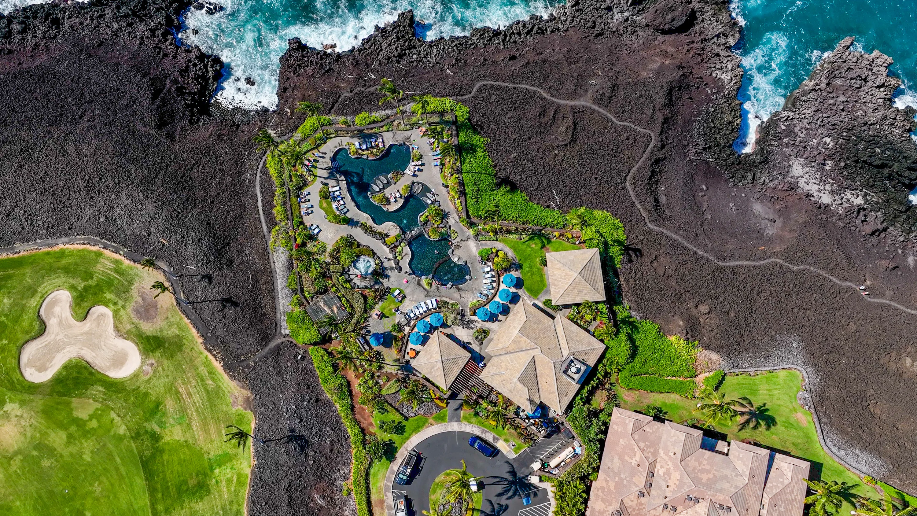 The Ocean Club's oceanfront patio and lagoon pool, Hali'i Kai, Waikoloa Beach Resort